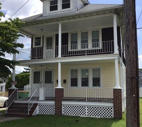 3 Bedroom Apartment features a covered balcony perfect for a rocking chair or bench.