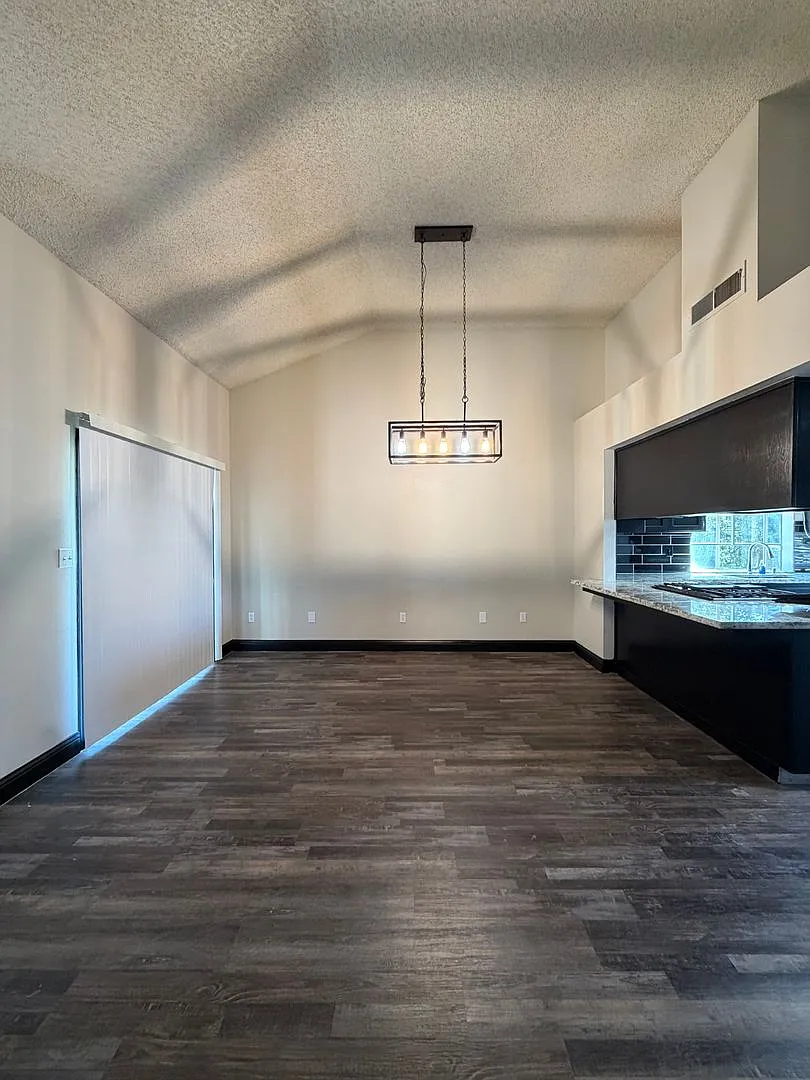 Save on Utilities! Corner Lot Home with Paid Solar, Vivint Security & Gardening Included — Photo 3