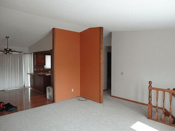 Vaulted living room and dining room on upper level