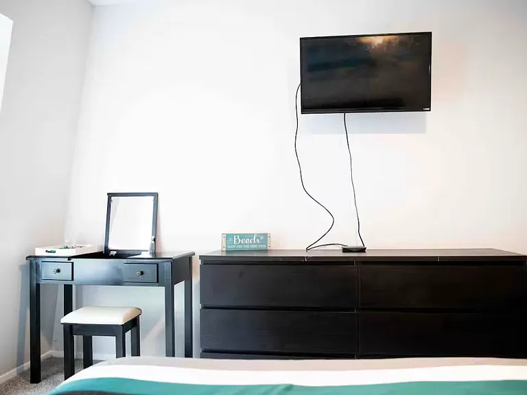 TV and Desk in Bedroom 1