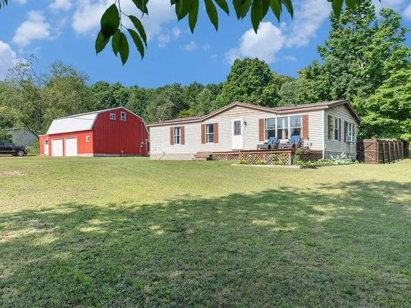 9792 Deal Rd, Williamsburg, MI 49690