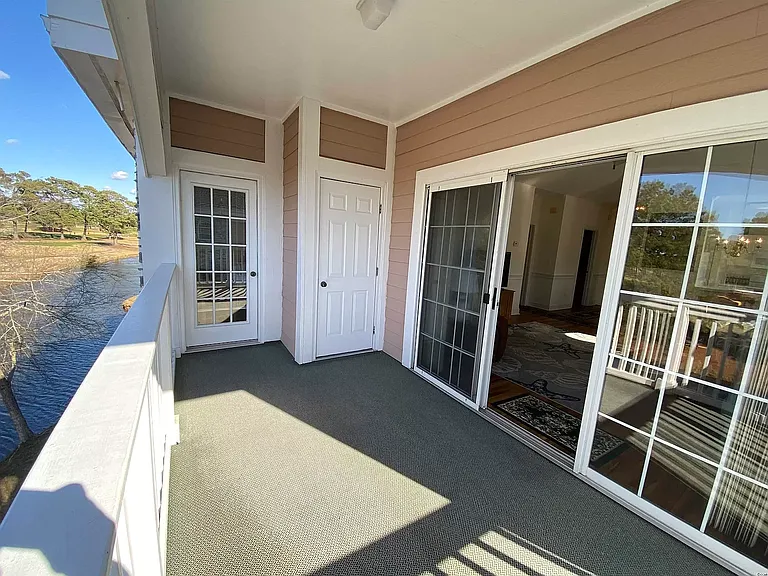Spacious balcony and outdoor storage closet.