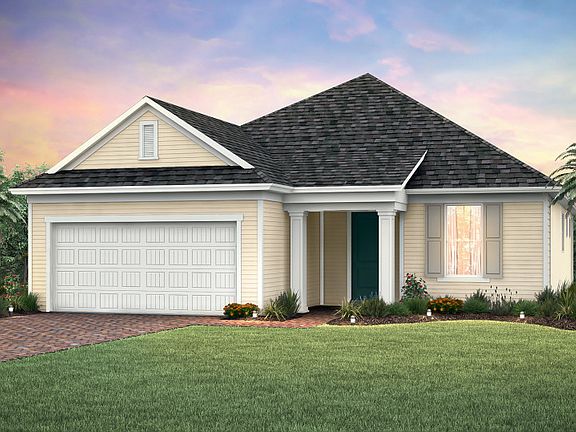 Home Exterior LC3B with decorative brick paver driveway