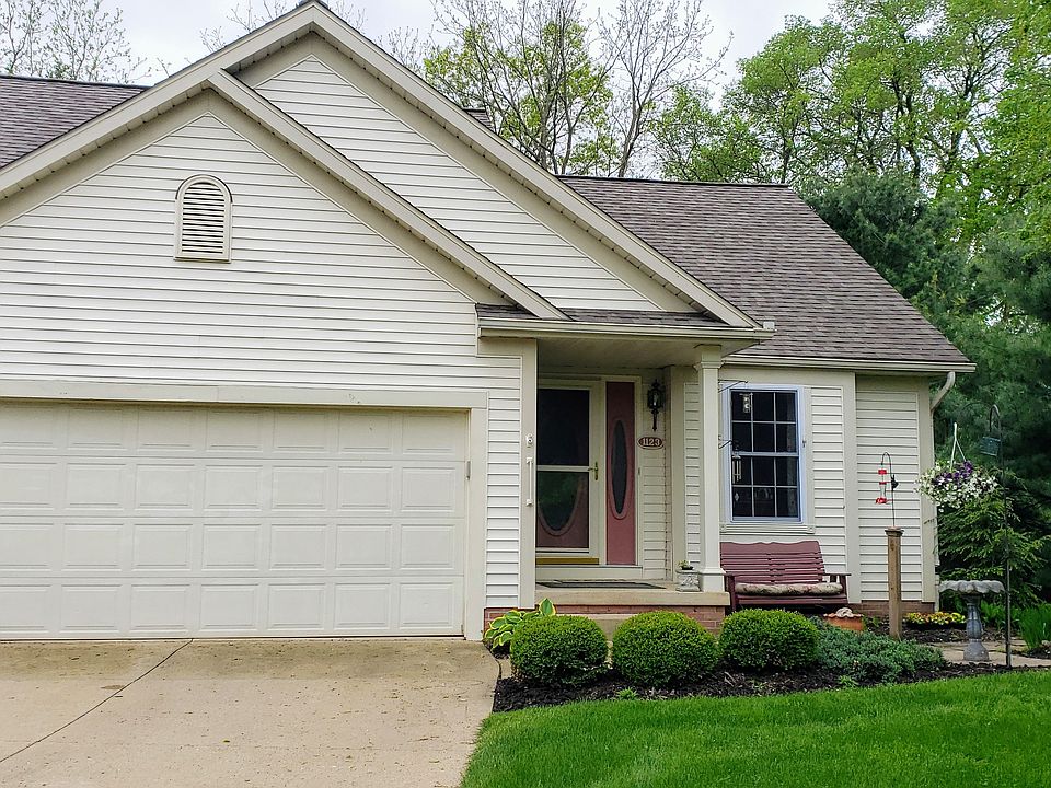 Double garage,  newer roof.