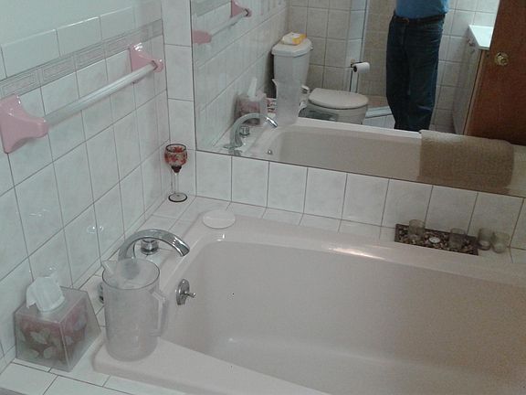 Bathroom with hot tub