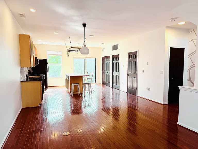 Living area looking into kitchen