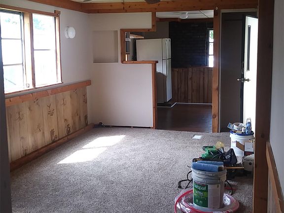 The living room and kitchen