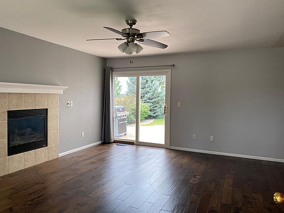 Living room. Hardwood floors and gas fireplace.