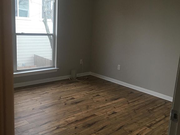 Large & light master bedroom. Fits a king bed, side tables and dresser.
