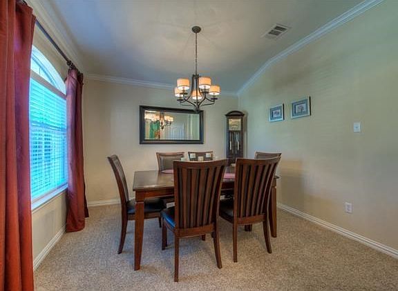 The formal dining room is located off the foyer entry.