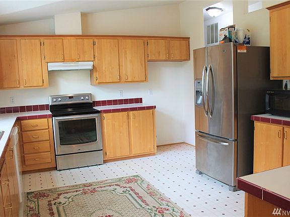 Look at this massive kitchen!!!  There is so much storage room here, you will absolutely love it!