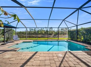 7457 Winding Cypress Dr, Naples, FL 34114