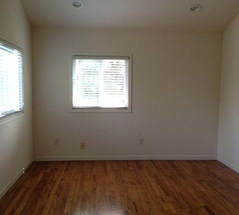 large living room with vaulted ceiling Lots of natural light
