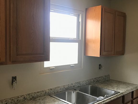 Large double sink next to the dishwasher