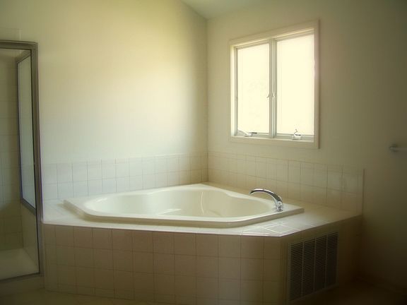 Come soak in the deep Kohler tub in the master bath.