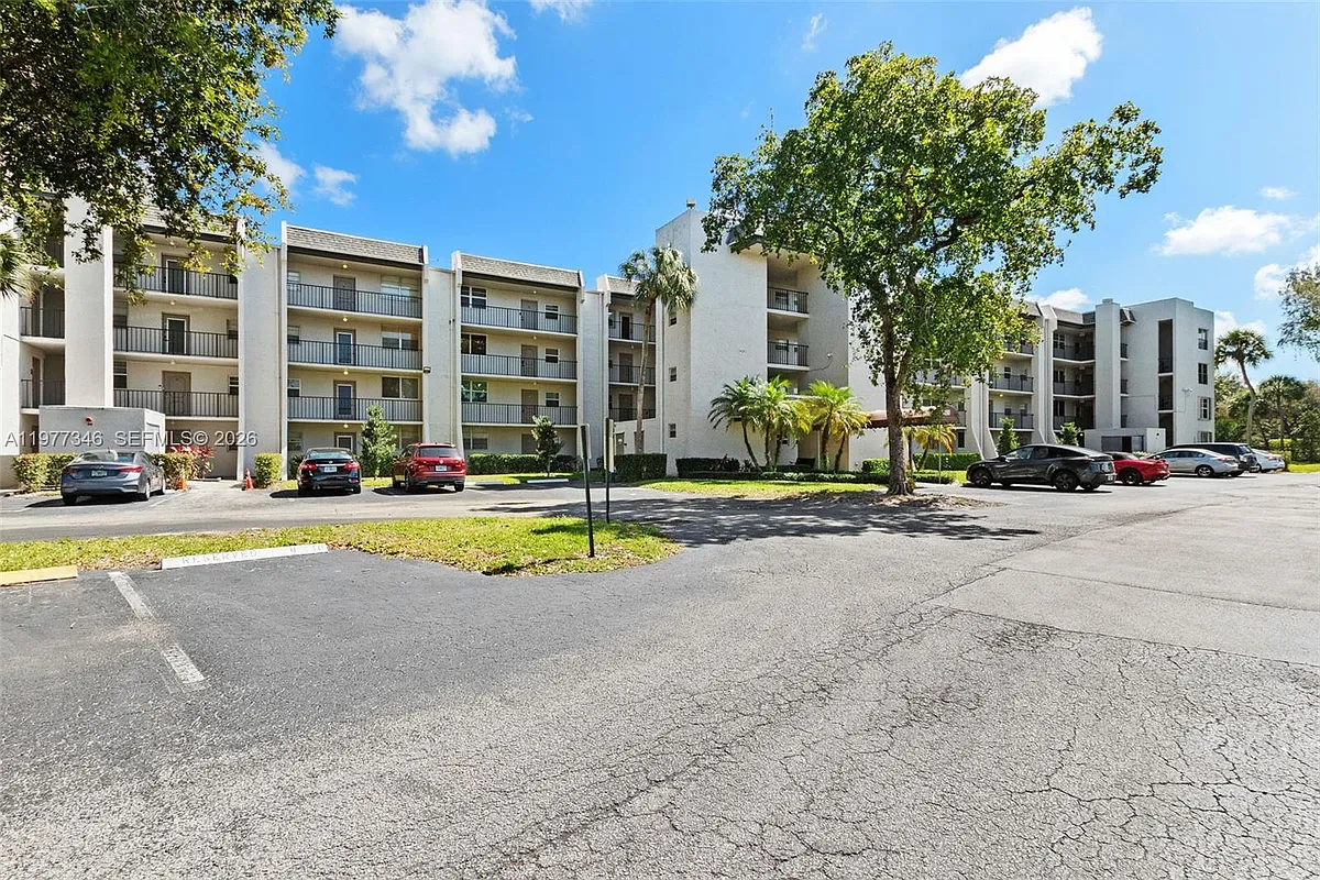 Building Photo - 9480 Poinciana Pl #407