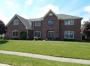 Exterior Front. Check out all the brick!  Not a lot of maintenance here!  New 3D roof in 2012. Nice landscaping beds too.