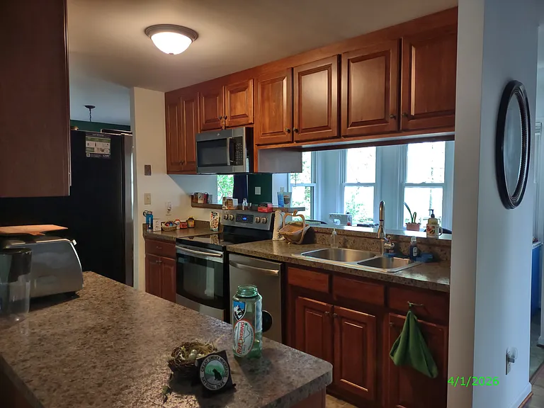 This photo has not been altered in any way: no edits or filters have been applied to try to deceive the viewer by having the room appear larger or brighter than it actually is.