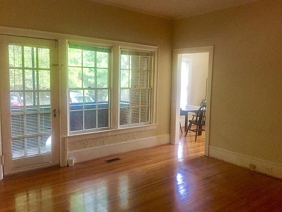 Photo of living room unfurnished, beautiful hardwoods throughout, tons of natural light