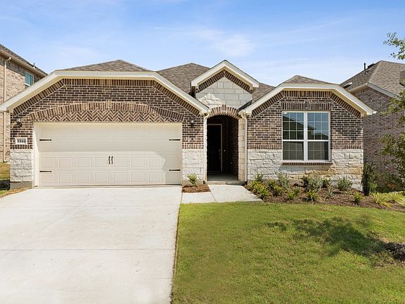 McKinney home design with stone, brick, and 2-car garage