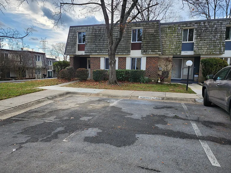 Front of house with parking