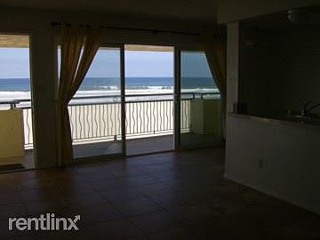 Living room with view of ocean