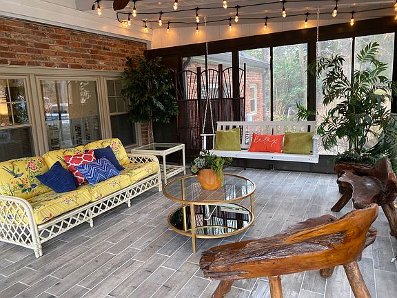 An evening retreat under glowing lights, where your oasis view takes center stage.