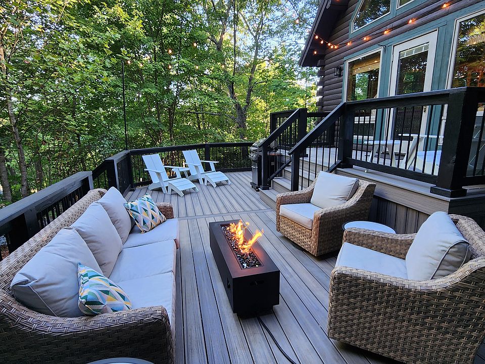 Trex deck install in 2023, couch, two rockers with waterproof covers, Adirondack chairs, gas grill, propane firetable.
