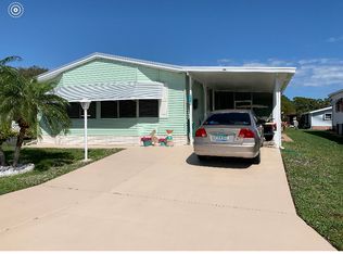 1066 Royal Palm Dr, Barefoot Bay, FL 32976