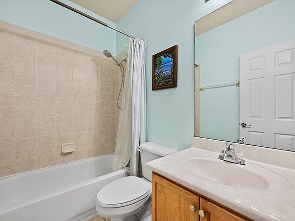 5th image of 335 E Thatch Palm Cir