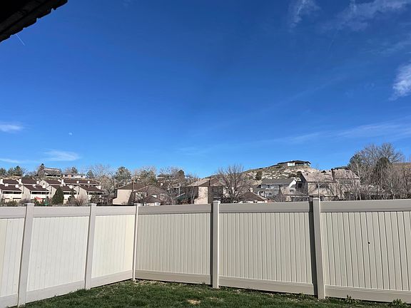 Manageable sized lawn with privacy fence