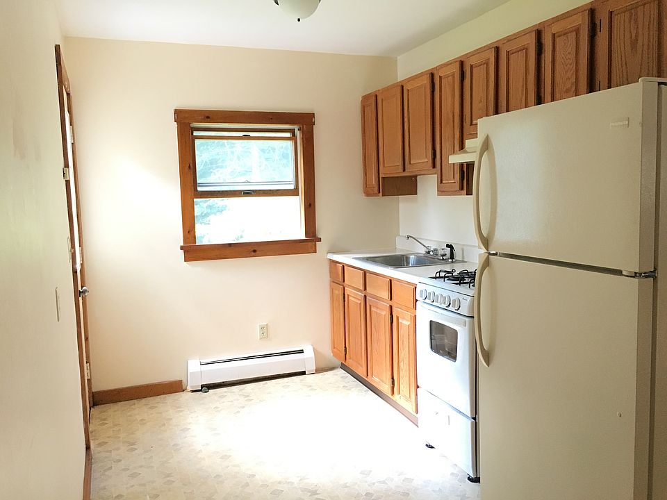 Kitchen with back door on left