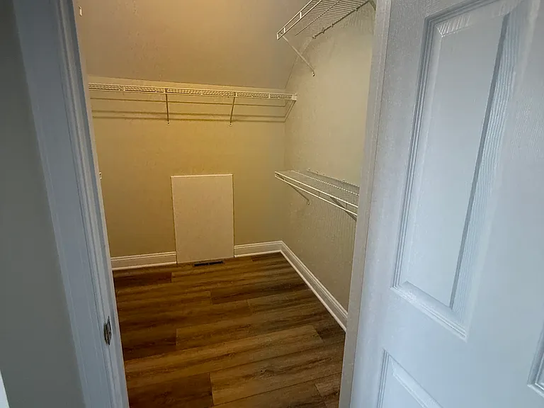 upstairs closet for primary bedroom
