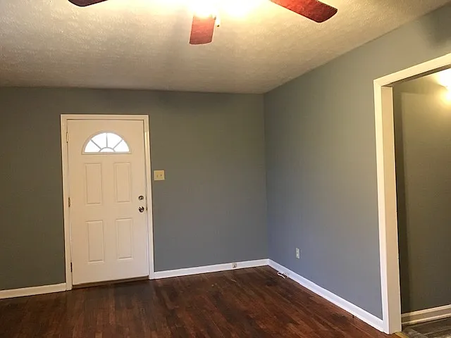 Front Door Entrance from inside living room area.