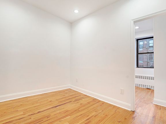 3rd image of 185 E 3rd St APT 4D