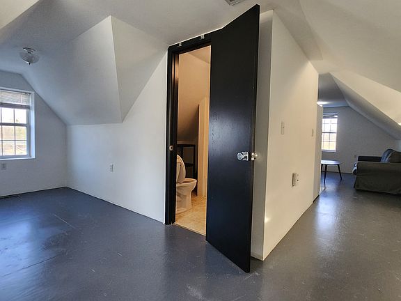 Bedroom with the hallway to the living room on the right