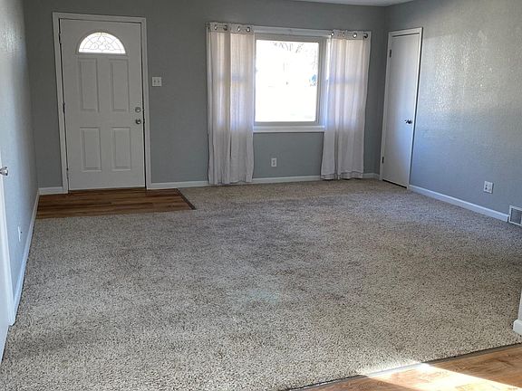 Living room and entry from dining room