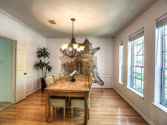 Bright Dining Room with crown molding, just off entry.