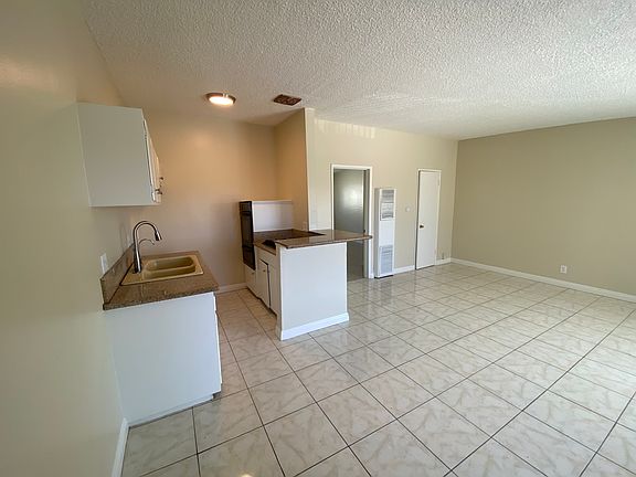 Open kitchen with granite counter tops