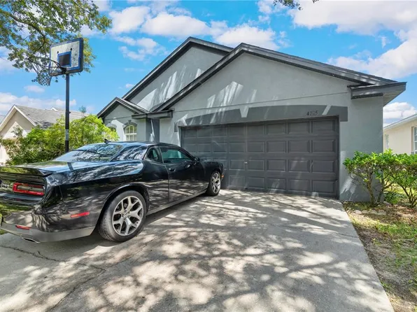 4705 WHISPERING WIND AVENUE, TAMPA, FL 33614