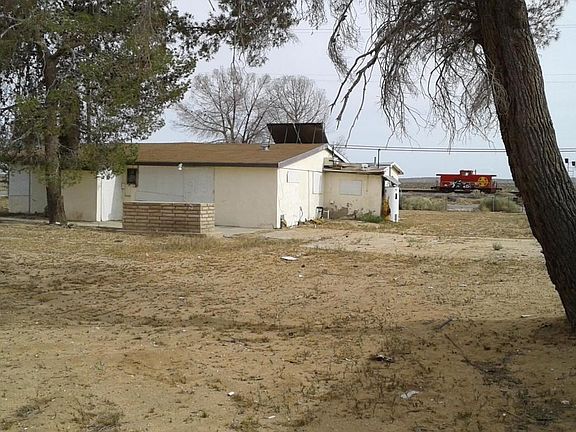 26119 TMT Back looking at side of home