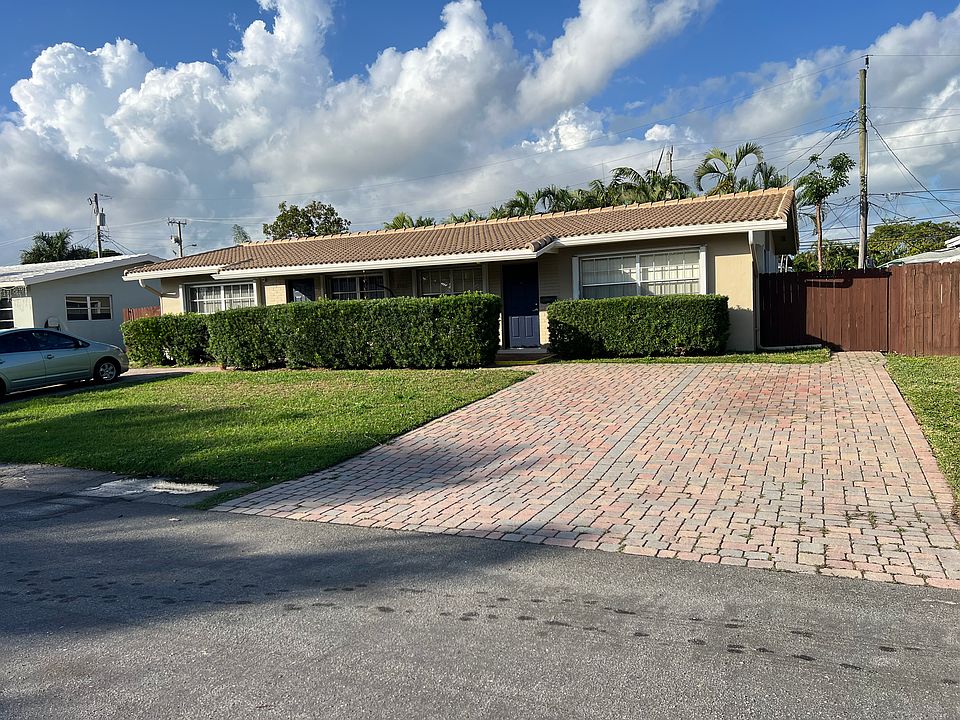Front of house (east parking spots are assigned to east unit)