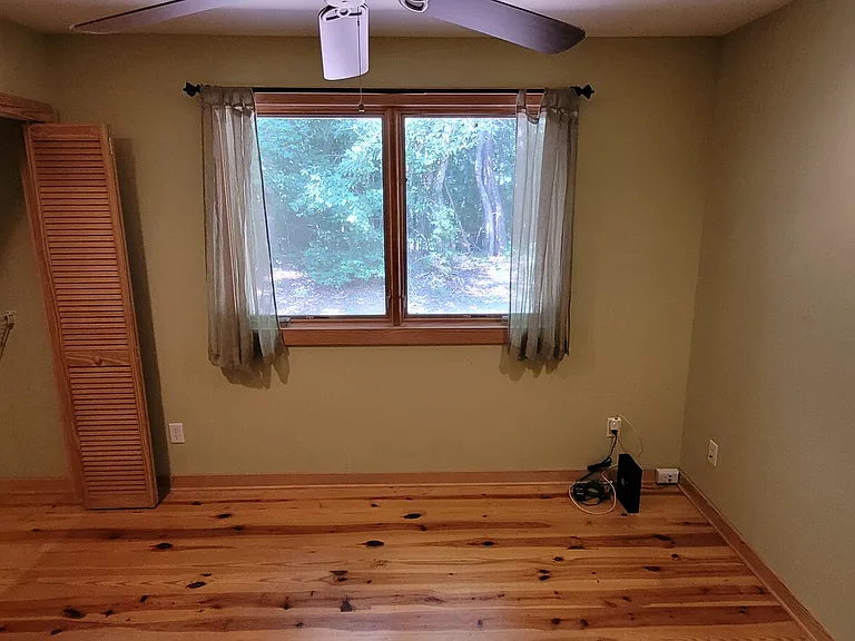 Middle Bedroom, closet opened.