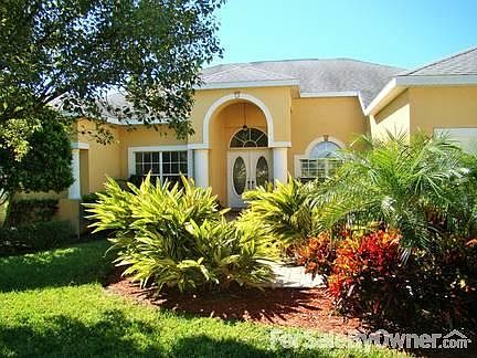EAST FACING EXTERIOR
						:
						BEAUTIFUL MANICURED LAWN AND COLORFUL PLANTS LEAD YOU TO ENTRANCE.