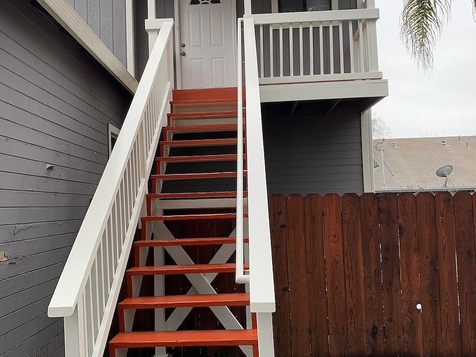 Upstairs duplex unit with private, fenced yard and garage parking.