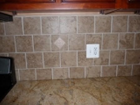 Custome tile on backsplash and floors.