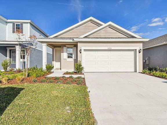 Cypress new construction quick move-in home plan front exterior centered view at BridgeWater in Lake