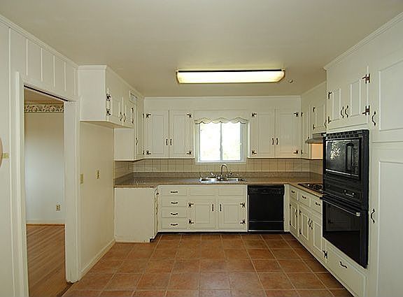 Mexican tile floor in Kit.