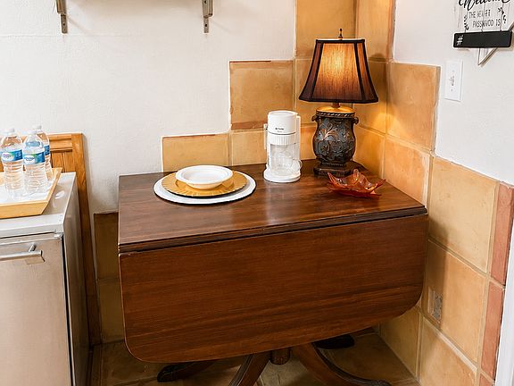 Landing/Hospitality area with drop-leaf table