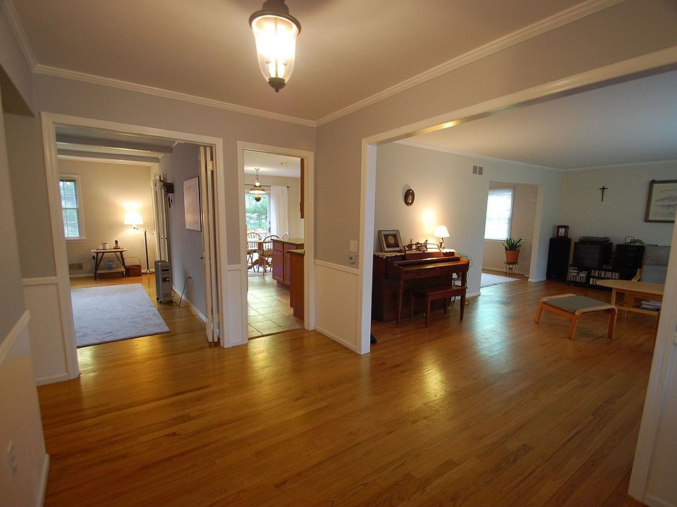 Foyer - hardwood floors, guest closet